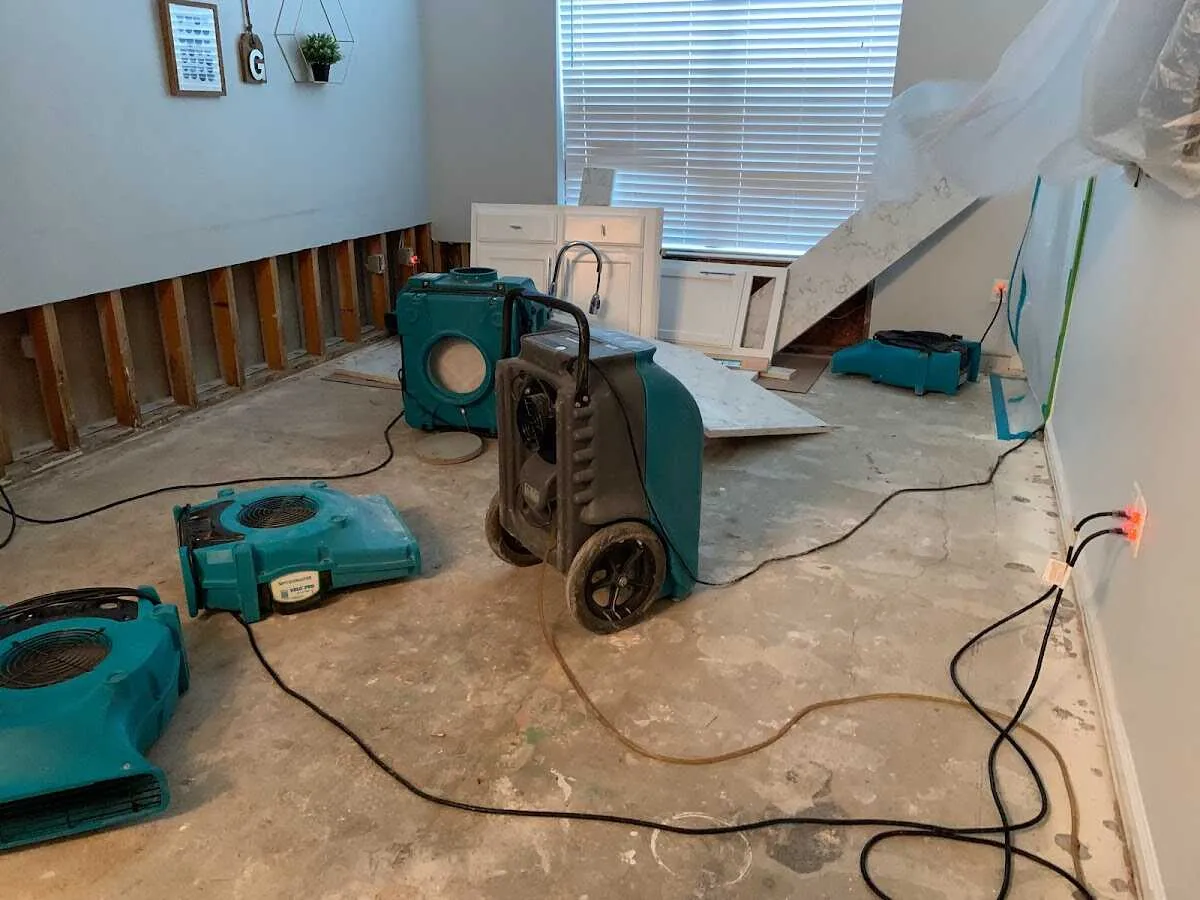 Dehumidifier in flood-cut room for Water Damage Restoration in New Braunfels